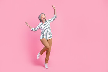 Sticker - Full length photo of pretty cute lady wear smart casual clothes dancing looking empty space isolated pink color background