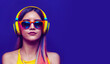 © JJAVA - Girl with Headphones Listening Music on a Blue Background  (Generative AI)