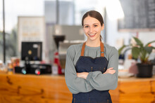 Open Small Business, Happy America, Canada, Woman In An Apron Standing Near A Bar Counter Coffee Shop, Small Business Owner, Restaurant, Barista, Cafe, Online, SME, Entrepreneur, And Seller Concept
