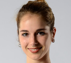 Fashion beauty portrait of young beautiful woman wearing earrings. 