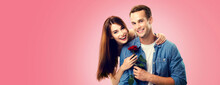 Love, Relationship, Dating, Flirting, Romantic Concept - Portrait Picture Of Happy Couple With Flower, Isolated On Vivid Rose Pink Background. Copy Space For Some Text.