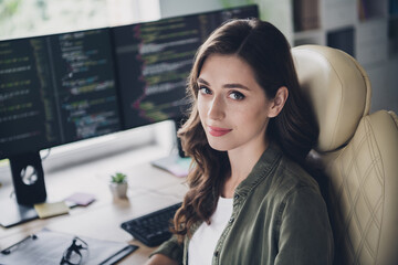 Photo of smart gorgeous successful lady sitting comfort chair home hacking sites remove viruses fix bugs indoor home workstation
