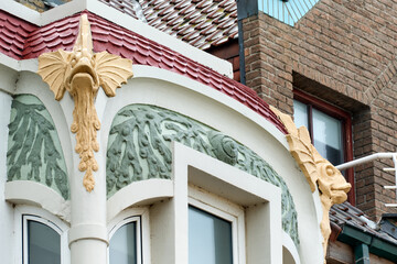 art nouveau detail on the facade of an old seaside buildings at Malo-Les-Bains beach in Dunkirk, france