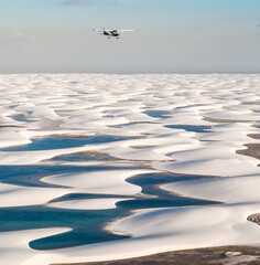 Wall Mural - sightseeing plane over the white sand dunes of Lencois Maranhenses