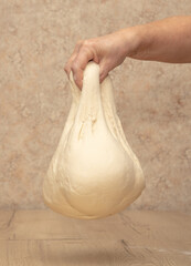 Wall Mural - Hand kneading flour dough.