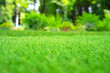 Artificial grass. Landscaping with artificial turf background. Selective focus.