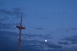 mast of the ship and moon in the night