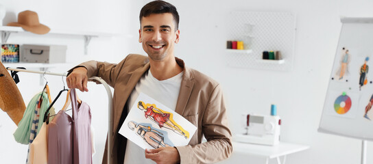 Poster - Portrait of male clothes stylist in workshop