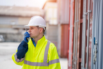 Poster - Technician working and inspecting cargo container in shipping yard,Container Shipping Logistics concept.