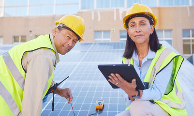 Wall Mural - Tablet, solar energy or engineering team working solar panels or technology on rooftop for renewable energy. Teamwork, portrait or construction workers on a city building for maintenance inspection