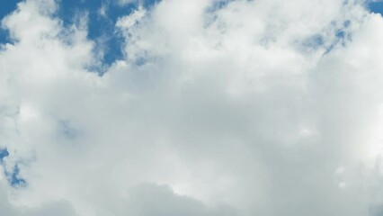 Wall Mural - time lapse of blue sky and white clouds