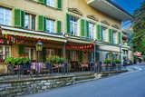 Fototapeta Most - Small restaurant in traditional village in Swiss Alps