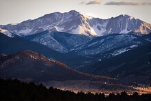 Colorado Rocky Mountains - The Rockies are an iconic mountain range in the western United States. Scenic view of snow-capped mountaintops created by generative AI, 