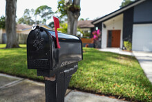Black Mailbox In Front Of A House