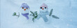 Winter snow snowman background panoramic banner panorama - Little cute Snowman sits on snow in snowy forest with snowflakes and sunshine..