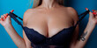Close-up of sexy breasts in bra. Woman's breasts or big natural boobs in lingerie. Plastic surgery