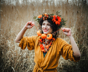 Wall Mural - girl in a wreath of flowers