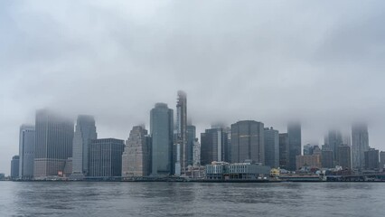 Fototapete - Timelapse of manhattan at foggy morning, New York City. Panning effect.