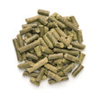 © Coprid - Top view of dry  green grass pellets