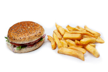 Wall Mural - Tasty, fresh hamburger with french fries on a white table unhealthy food