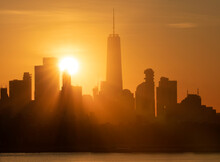 Sunbeams Shining Over The Manhattan Skyline