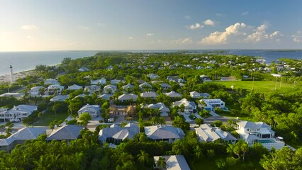 Wall Mural - View from above of large residential houses in island small town Boca Grande on Gasparilla Island in southwest Florida. American dream homes as example of real estate development in US suburbs