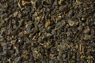 Canvas Print - Chinese Ti Kuan Yin dried tea leaves full frame close up as background