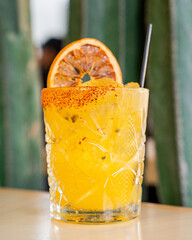 mezcal drink with maracuya fruit