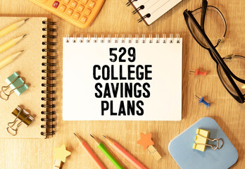 529 College Savings Plan Form With Small Graduation Hat, Spectacles And Pen Over White Background