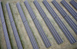 © Richard Johnson - Solar heat panels providing alternative energy to local village