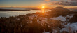 Aerial Winter Sunrise Over Hale Passage and Lummi Island. Snow blankets this lovely small island located minutes from Bellingham, Washington and accessed by a twenty one car ferry boat. 