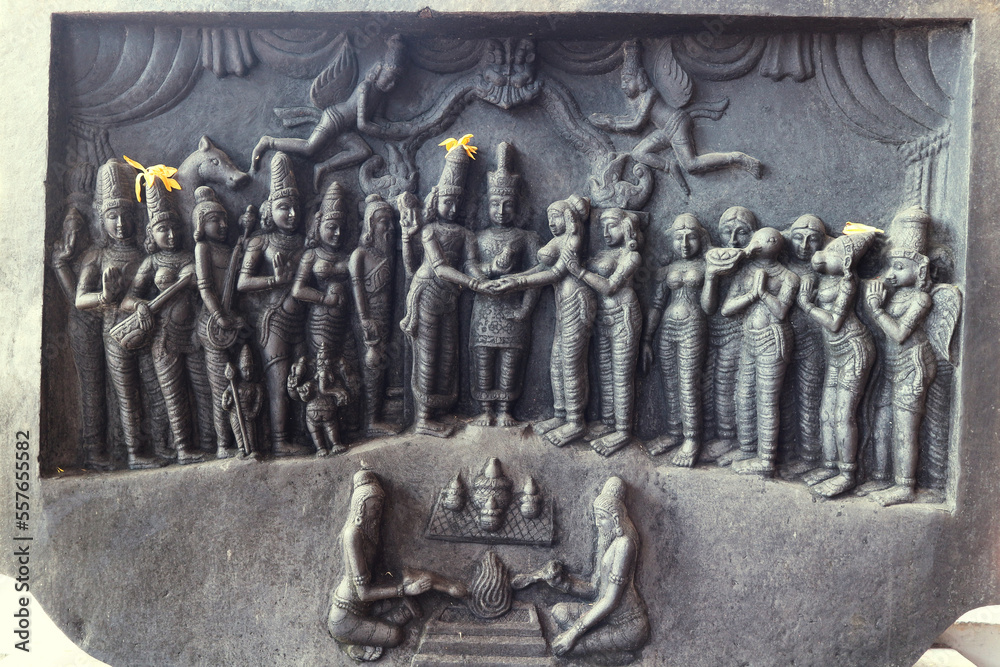 The wedding of Balaji and Padmavati is carved on a stone outside a Hindu temple in Tirumala, Tirupati, India.