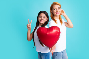 Poster - Valentines day. Smiling mother and daughter holding love heart balloon on blue background. Happy Valentines day to my mom.