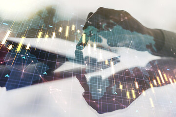 Poster - Multi exposure of abstract financial diagram with world map and hand working with a digital tablet on background, banking and accounting concept