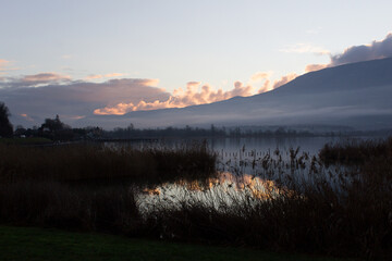 Wall Mural - sunset with water and sky view of mountains lake  du Bourget savoie region france