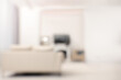 Leinwandbild Motiv Blurred view of stylish living room interior with cozy sofa