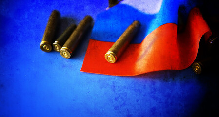 Wall Mural - Abstract background concept Russian army. Russian flag and bullet casings on the table.