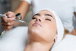 © nenetus - Beautiful woman getting oxygen face therapy in a beauty salon. Professional skin care treatment.