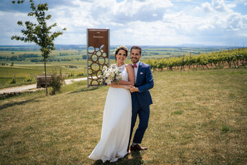 Wall Mural - Wedding couple, bride and groom in the vineyards of Rheinhessen