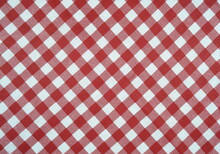 Red White Checkered Classic Pattern Cotton Fabric Background.