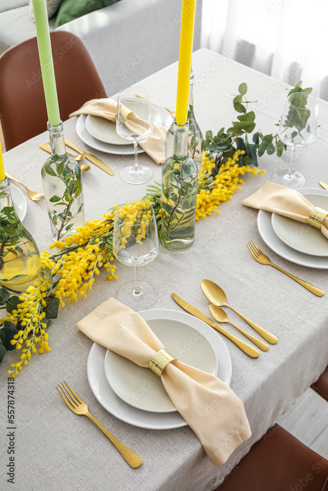 Setting and beautiful floral decor on served table