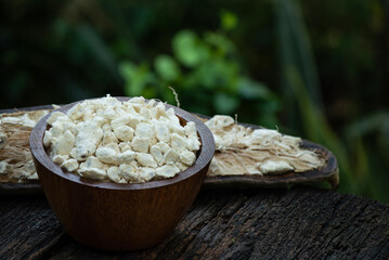 Wall Mural - Fresh baobab pulp on nature background.