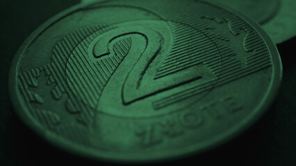 Wall Mural - Translation: 2 zloty. Fragment of Polish two zloty coin close-up. National currency of Poland. Dark green tinted background for news about economy or finance. Polish money. Macro