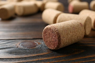 Canvas Print - Many corks of wine bottles on wooden table, closeup