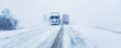 Leinwandbild Motiv Freight transportation truck on the road in snow storm blizzard