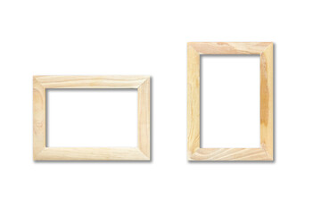 Wall Mural - Two wooden picture frames hanging on a white wall