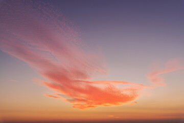 Wall Mural - Dramatic colorful red orange to dark blue sunset or sunrise sky landscape clouds. Natural beautiful cloudscape dawn background wallpaper. Stormy windy nature twilight dusk scene panorama