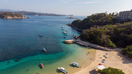 Bahía de Huatulco La Entrega, Oaxaca Mexico, aerial photography with drone. blue colored beach