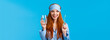 Advertising, hygiene and people concept. Feminine cute redhead girl feeling upbeat and enthusiastic start day right, drinking water, holding glass and toothbrush, wear nightwear and sleep mask