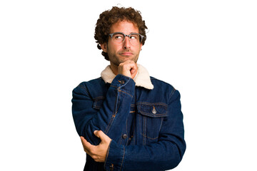 Wall Mural - Young curly smart caucasian man cut out isolated looking sideways with doubtful and skeptical expression.